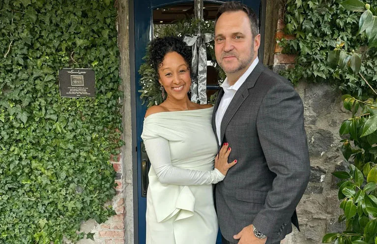 Adam Housley with Tamera Mowry